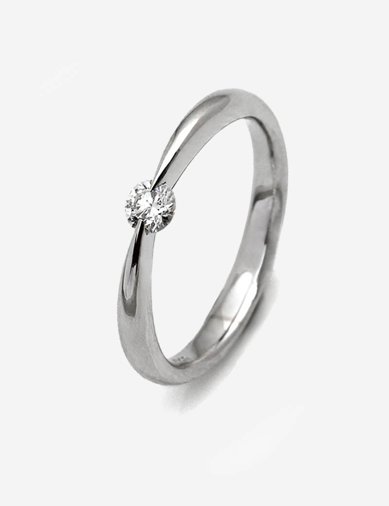 Capella: Anillo Solitario Oro Blanco 18k con Diamante  0,18 kts