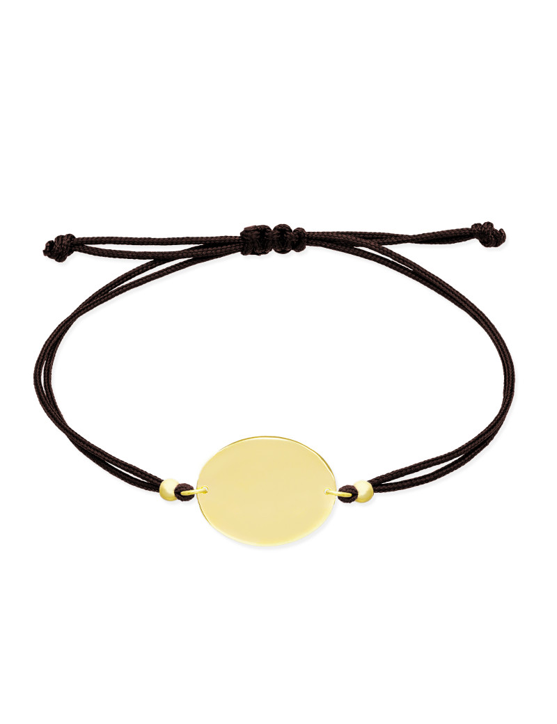 Pulsera personalizable de oro amarillo 18k con chapa ovalada central y doble cordón de nylon negro ajustable