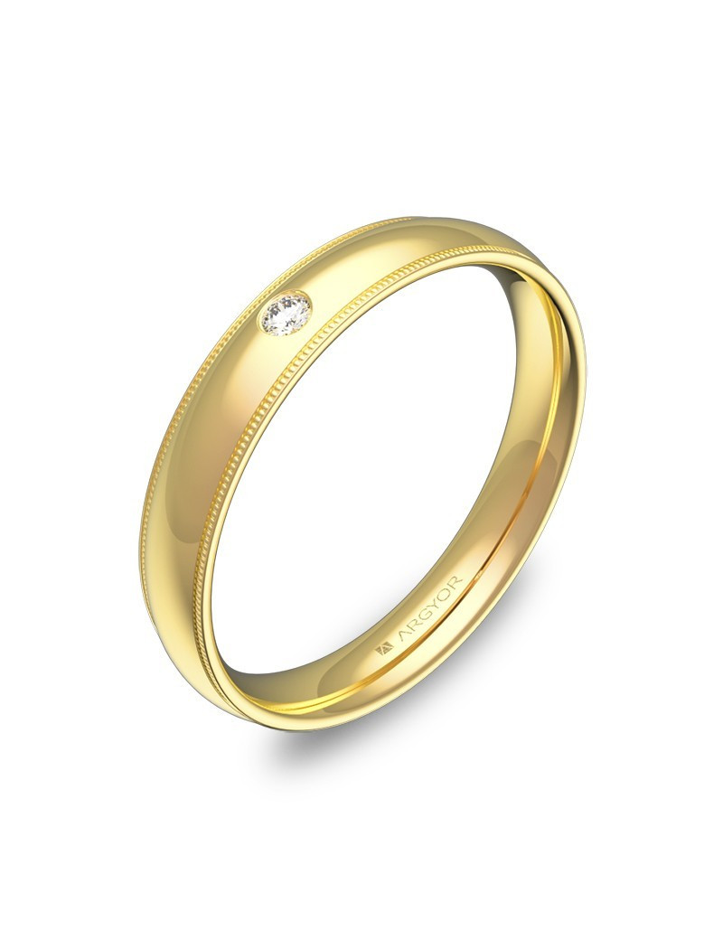 Anillo de media caña en oro amarillo de 18k con acabado pulido, biseles milgrain y un diamante central.