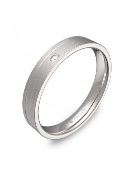 Anillo de diseño plano en oro blanco de 18k con acabado satinado y un diamante brillante en ranura.
