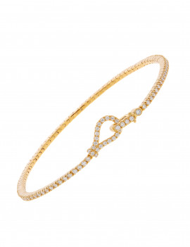 Pulsera de diamantes con un cierre de nudo elaborado en oro amarillo sobre fondo blanco.