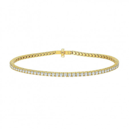 Clásica pulsera de rivière con una hilera continua de diamantes talla brillante de oro amarillo 18k