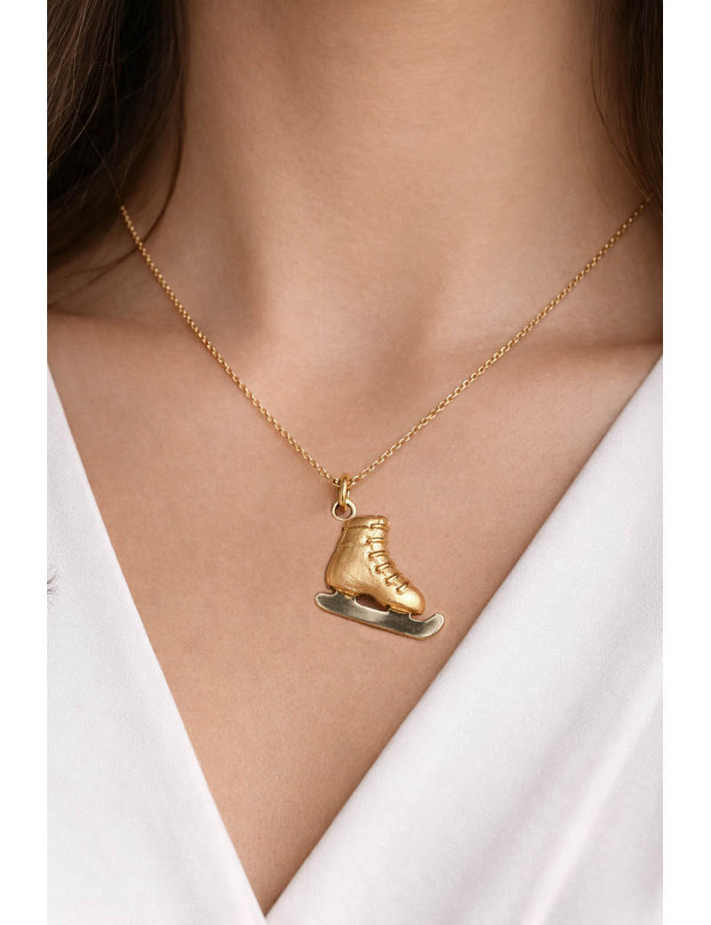 Colgante Patín de Hielo de Oro Bicolor 18k · 1.6x2cm · Marga Mira