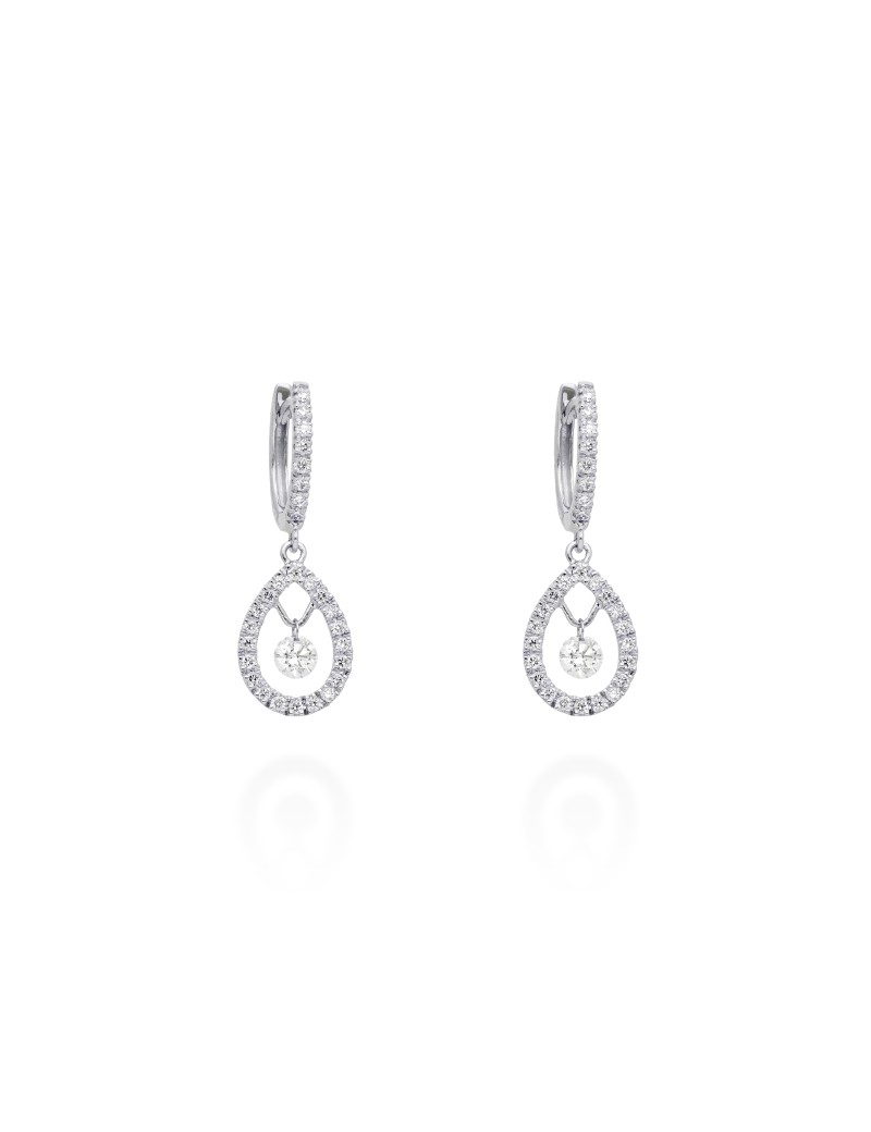 Pareja de pendientes tipo criolla en oro blanco de 18 quilates con colgante de lágrima calada y diamante solitario flotante.