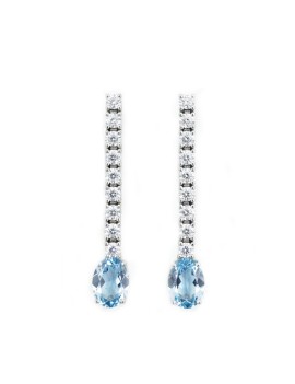 Pendientes de oro blanco 18k modelo Anna con aguamarinas ovales azul celeste y una hilera de diamantes de talla brillante.