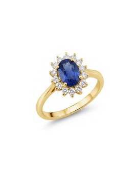 Anillo Victoria de oro amarillo 18k con zafiro ovalado de 0.81ct y halo de diamantes de talla brillante.