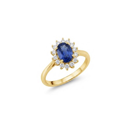 Anillo Victoria de oro amarillo 18k con zafiro ovalado de 0.81ct y halo de diamantes de talla brillante.